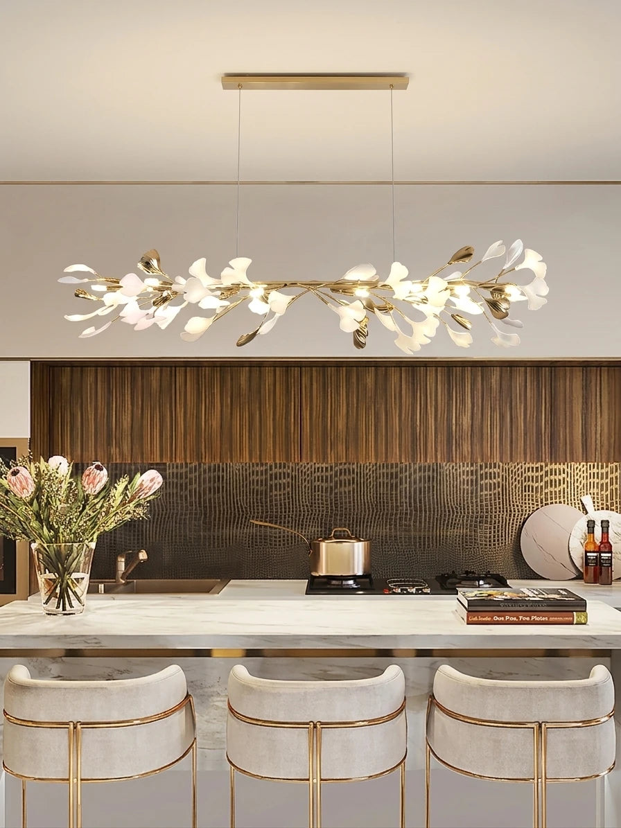 Modern Extended Gold Ginkgo Leaf Chandelier Over Kitchen Island