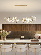 Modern Extended Gold Ginkgo Leaf Chandelier Over Kitchen Island