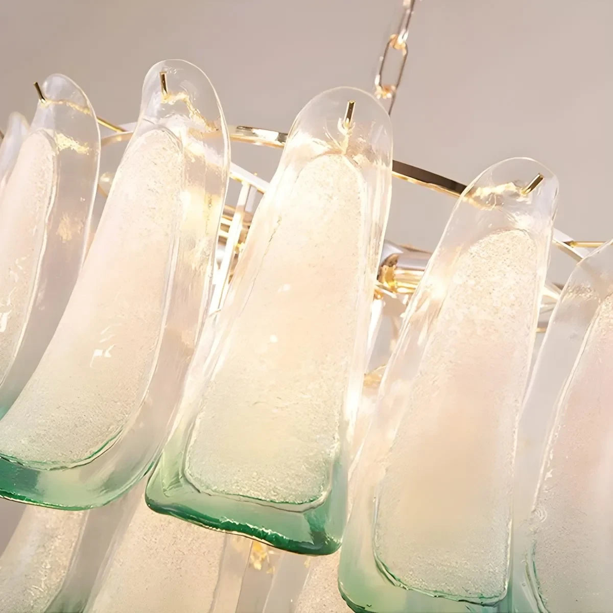 Close Up View of Brass Frame and Multi-Tier Feather Glass Connection Structure