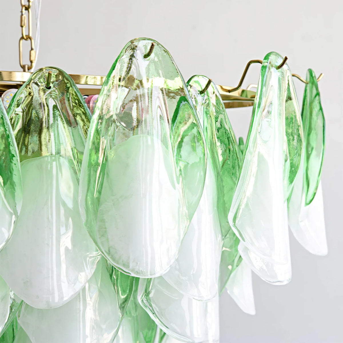 Close Up View of Multi-Tier Green Gradient Petals and Brass Hardware Structure