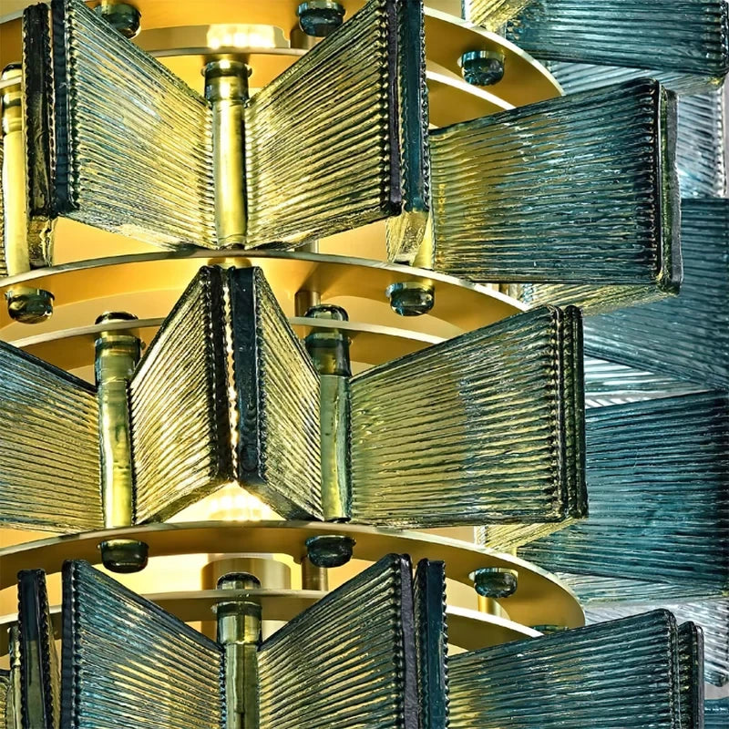 Close Up View of Teal Striped Art Glass Multi-Tier Arrangement and Brass Frame Details