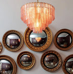 Modern Pink Multi-Tier Crystal Chandelier with Round Mirrors Background