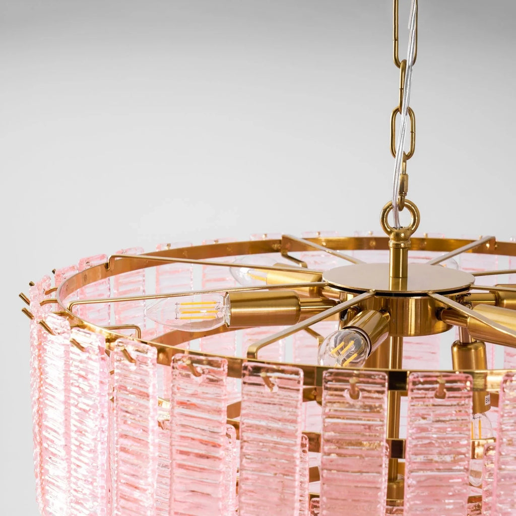 Close Up View of Pink Crystal Chandelier Brass Canopy and Internal Bulbs