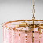 Close Up View of Pink Crystal Chandelier Brass Canopy and Internal Bulbs