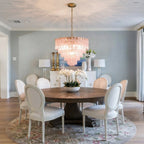 Modern Pink Crystal Glass Chandelier Over Round Dining Table