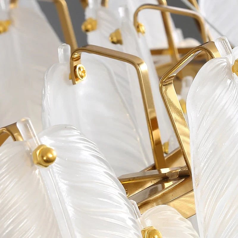 Close Up View of Modern Brass Frame and Feather Art Glass Connection Details