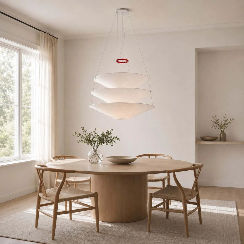 Modern White Fabric Tiered Chandelier Over Round Dining Table