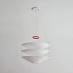 Angled View of Illuminated Modern Cascading White Fabric Chandelier