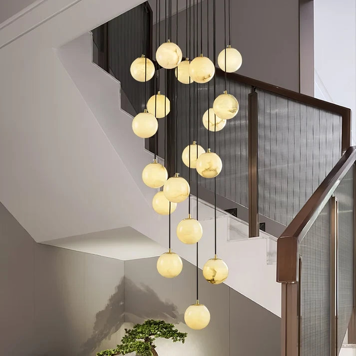 Modern Globe Alabaster Pendant Lights Over Staircase Hallway