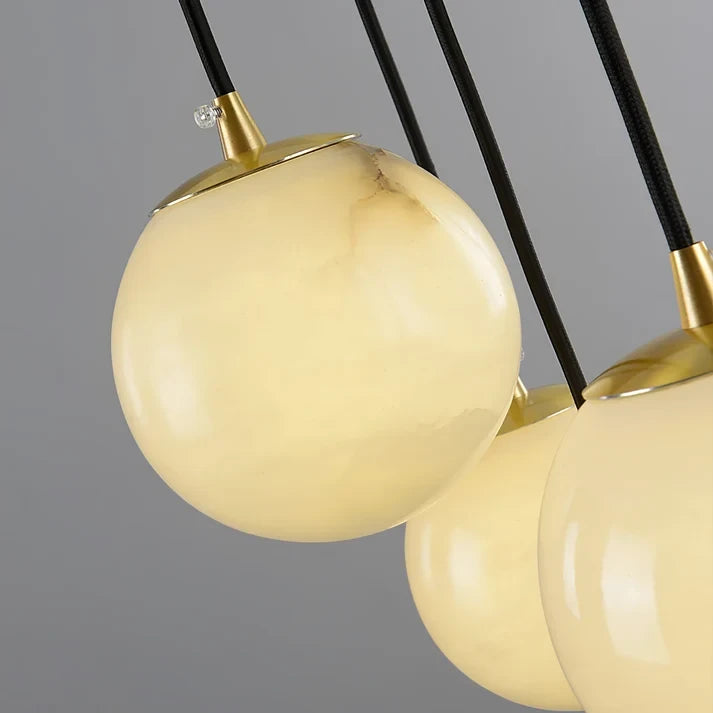Detail View of Alabaster Globe Shade and Brass Hardware