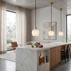 Modern Round Alabaster Pendant Lights Over Kitchen Island