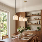 Modern Alabaster Art Glass Pendant Lights Over Dining Room Table
