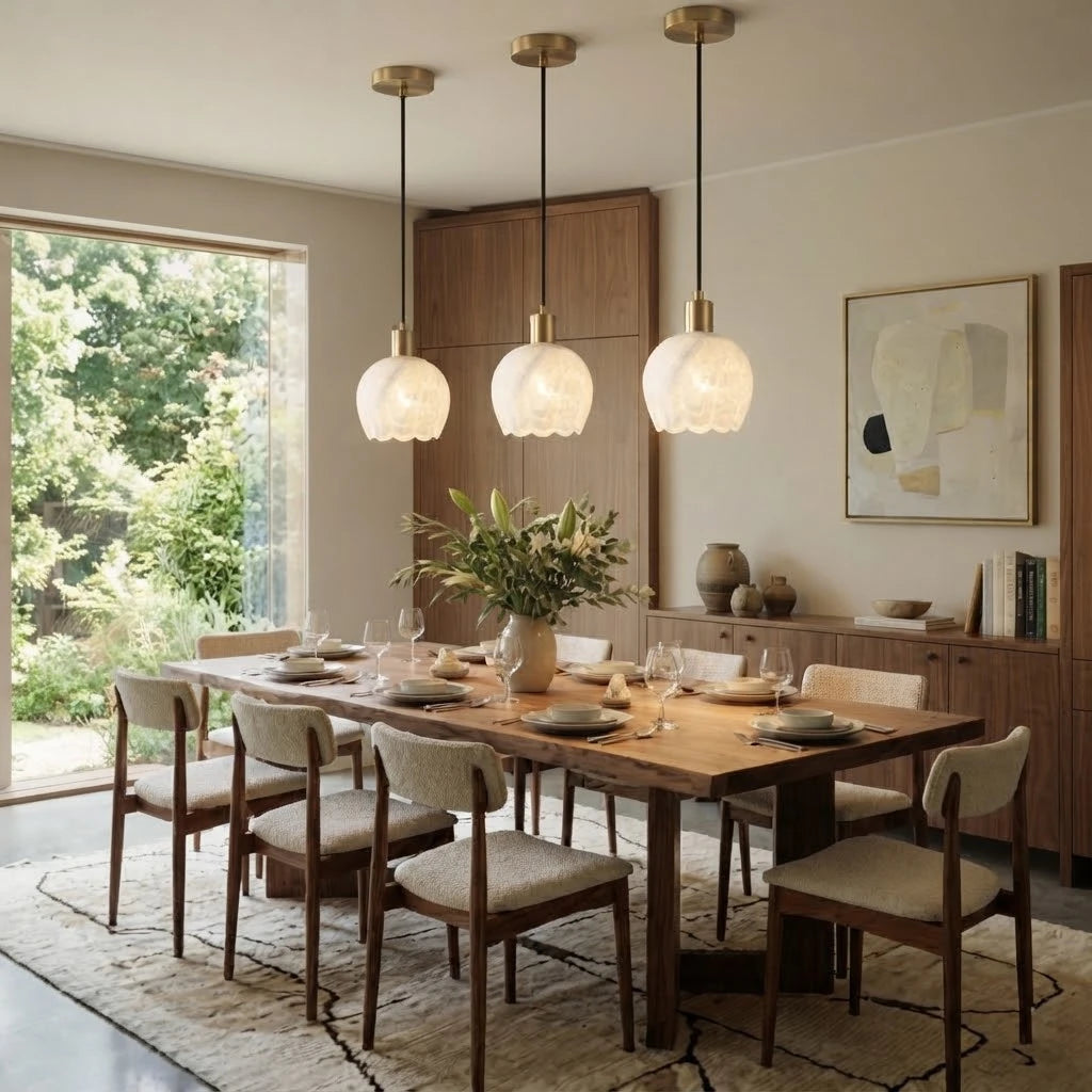 Modern Alabaster Pendant Lights Over Dining Area