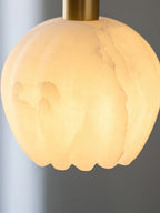 Front View of Illuminated Modern Alabaster Art Glass Pendant Light