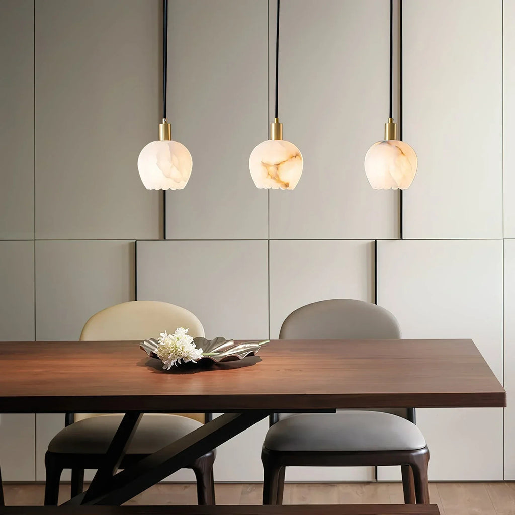Modern Round Alabaster Pendant Lights Over Dining Table