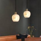 Modern Alabaster Pendant Light Over Dining Setting