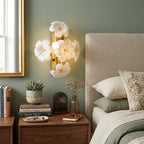 Modern White Ceramic Petal Wall Sconce in Warm Bedroom Setting
