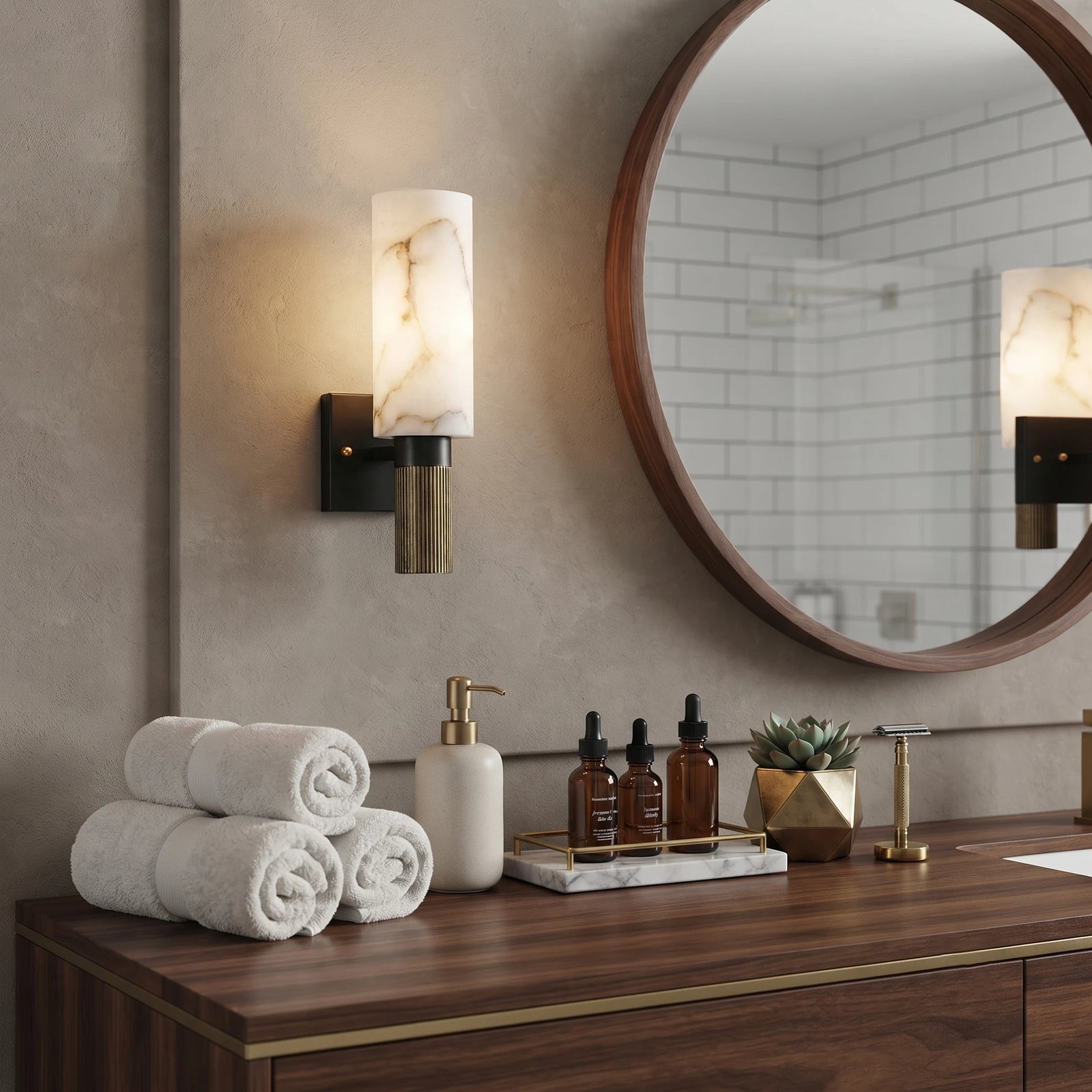 Alabaster Cylinder Vanity Sconce beside Bathroom Mirror