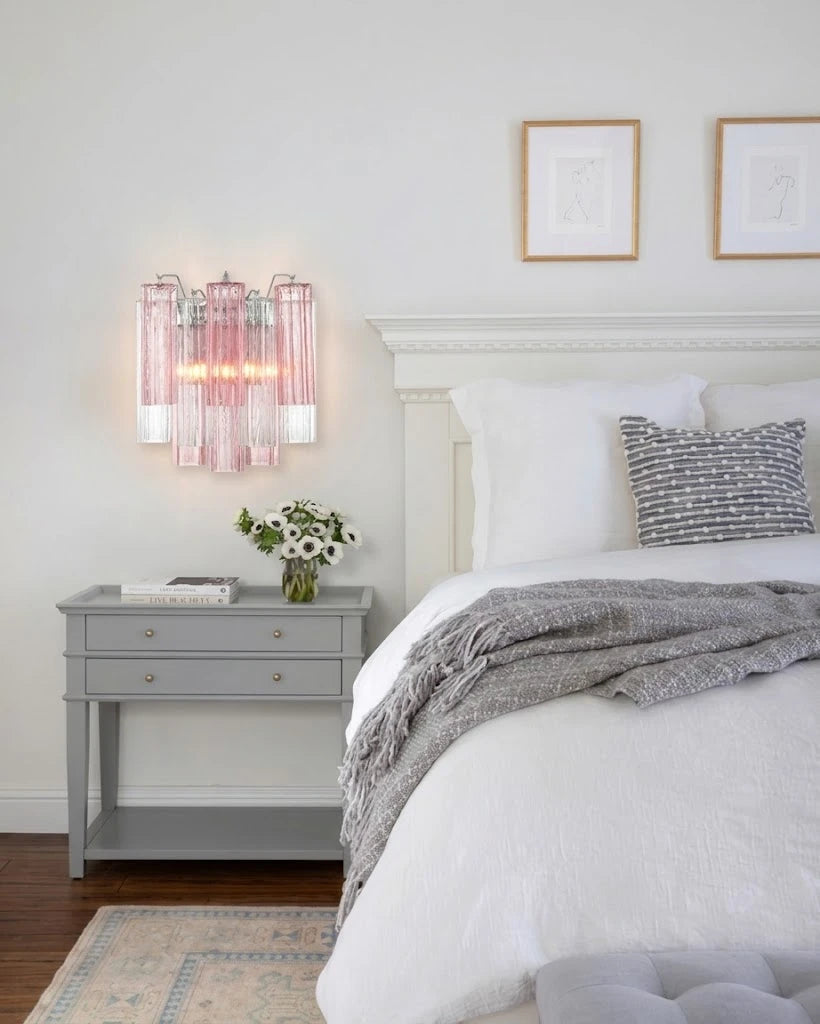 Modern Pink Striped Art Glass Wall Sconce Over Bedside Setting