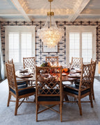 Modern Crystal Floral and Bead Chandelier Over Wooden Dining Table