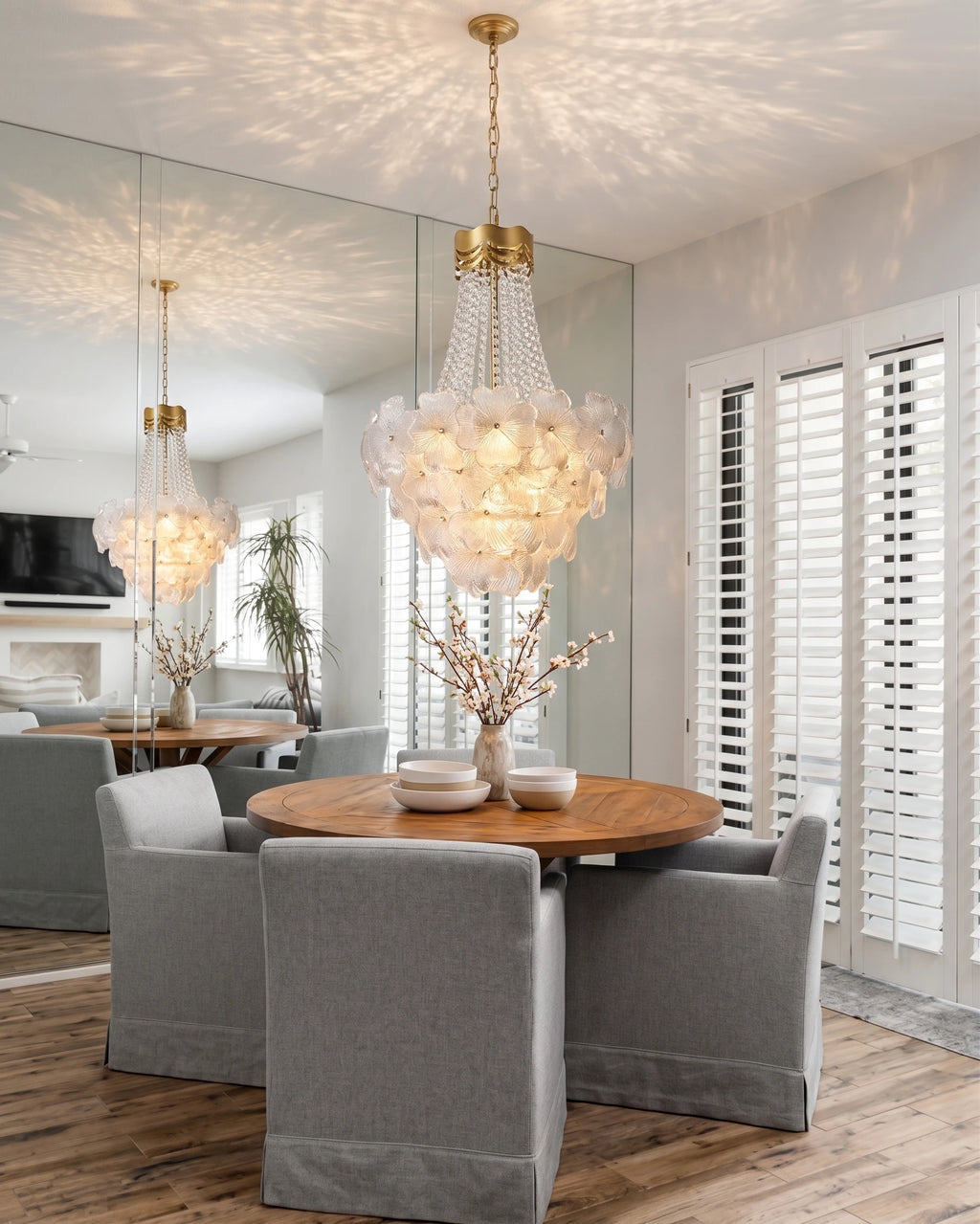 Modern Crystal Floral Chandelier Over Round Dining Table