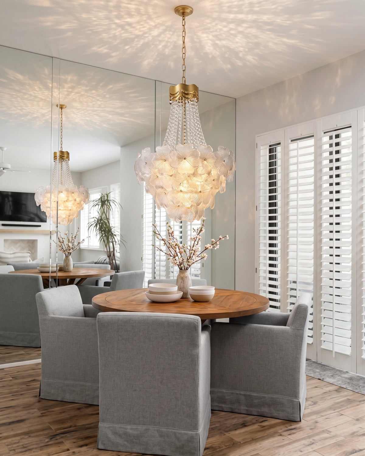 Modern Crystal Floral Chandelier Over Round Dining Table