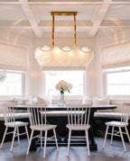 Modern Brass Shell Linear Chandelier in Cozy Dining Nook