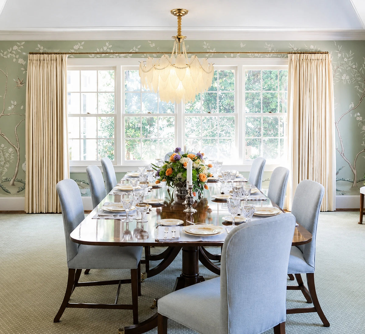 Gold Feather Glass Chandelier in a sunlit living room with neutral furnishings