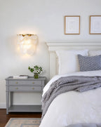 Modern Brass Pearl Shell Wall Sconce in Elegant Bedroom