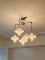 Illuminated Modern Multi-Light Diamond Art Glass Chandelier Studio Shot