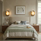 Pair of Brass Alabaster Sconces Flanking Bedroom Bed