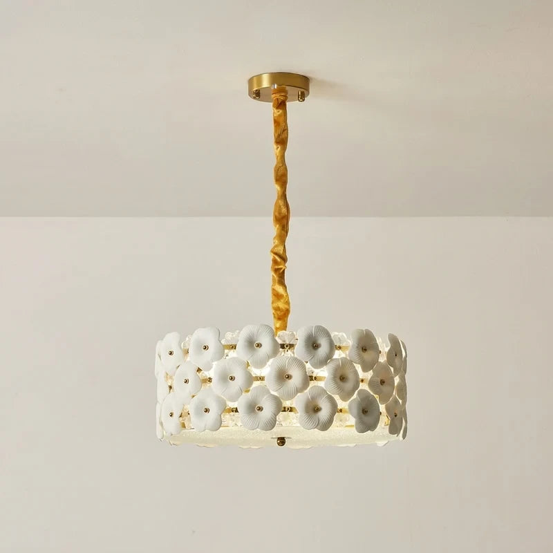 Side View of Modern Brass White Floral Art Glass Chandelier Studio Display