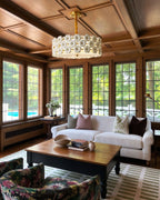 Modern White Floral Art Glass Chandelier in Sunroom with Wooden Beams