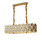 Modern Brass and Double-Tier White Floral Art Glass Linear Chandelier with Gold Canopy on Pure White Background