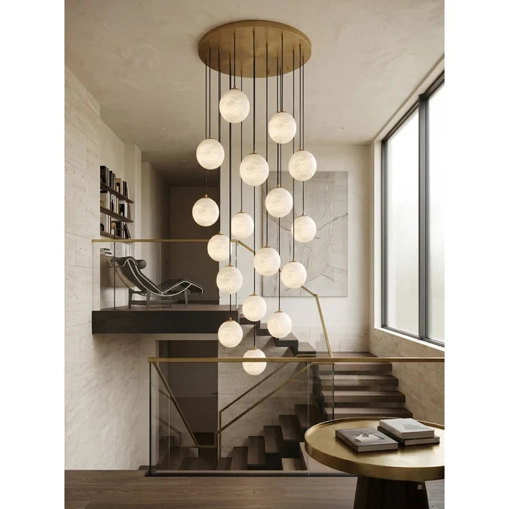 Large Brass Alabaster Globe Chandelier Over Multi Level Staircase