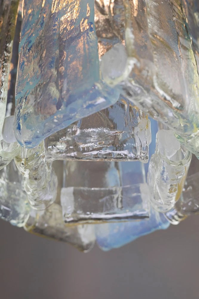 Close Up View of Silver Canopy Connection and Crystal Block Glass Structure
