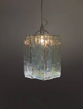 Illuminated Modern Crystal Block Art Glass Pendant Light Studio Shot on Dark Background