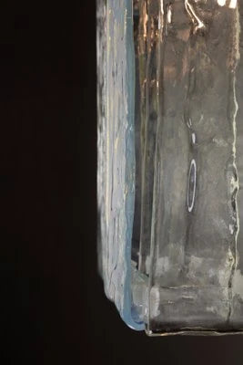 Close Up View of Crystal Block Glass Edge Texture and Details on Dark Background
