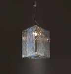 Illuminated Modern Silver Crystal Block Art Glass Pendant Light Studio Shot on Dark Background