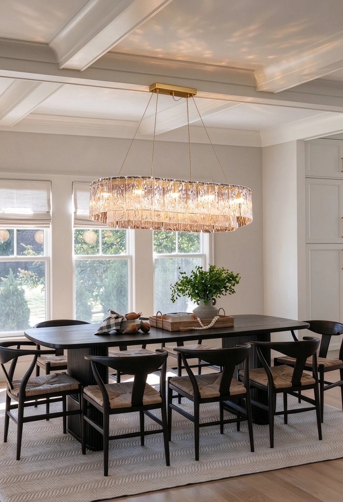 Modern Brass Crystal Irregular Disc Linear Chandelier in Elegant Dining Setting