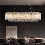 Illuminated Modern Brass Crystal Irregular Disc Linear Chandelier Studio Shot on Dark Background