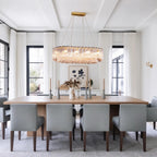 Modern Brass Crystal Irregular Disc Linear Chandelier in Formal Dining Room
