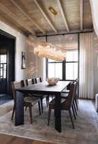 Modern Brass Crystal Irregular Disc Linear Chandelier in Retro Lounge Bar Setting