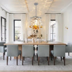Modern Clear and Amber Art Glass Chandelier Over Dining Room Table