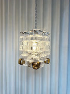 Illuminated Modern Clear and Amber Art Glass Pendant Light Studio Shot