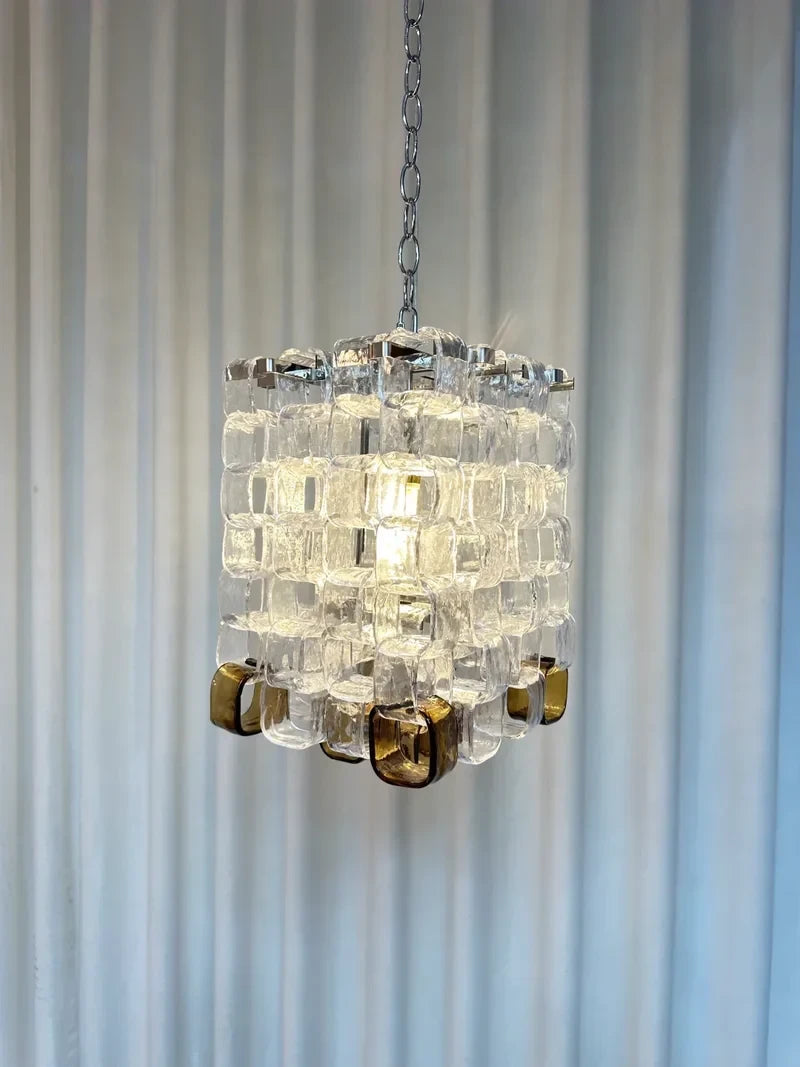 Illuminated Modern Clear and Amber Art Glass Pendant Light Studio Shot