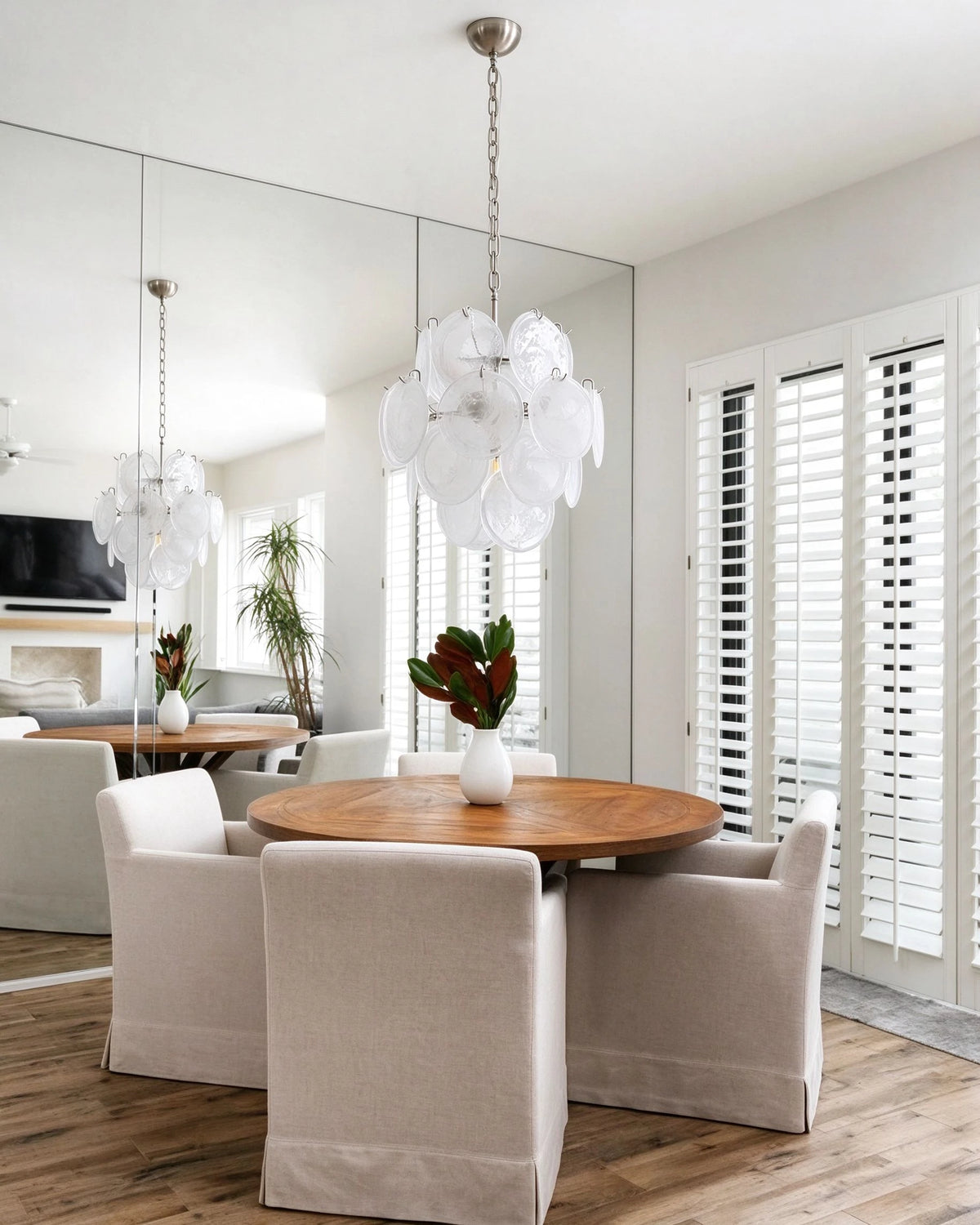 Modern White Disc Art Glass Chandelier in Contemporary Dining Space