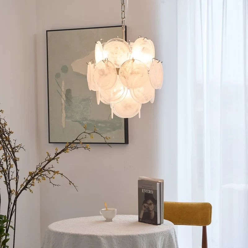 Illuminated Modern White Disc Art Glass Chandelier in Cozy Dining Setting