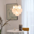 Illuminated Modern White Disc Art Glass Chandelier in Cozy Dining Setting