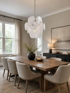 Illuminated Modern White Disc Art Glass Chandelier in Warm Dining Room